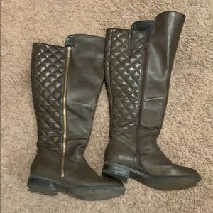 Knee high quilted pattern boots.